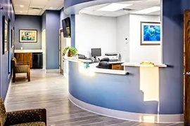 The reception desk and waiting area at John T. Thompson, DDS, in Corpus Christi.